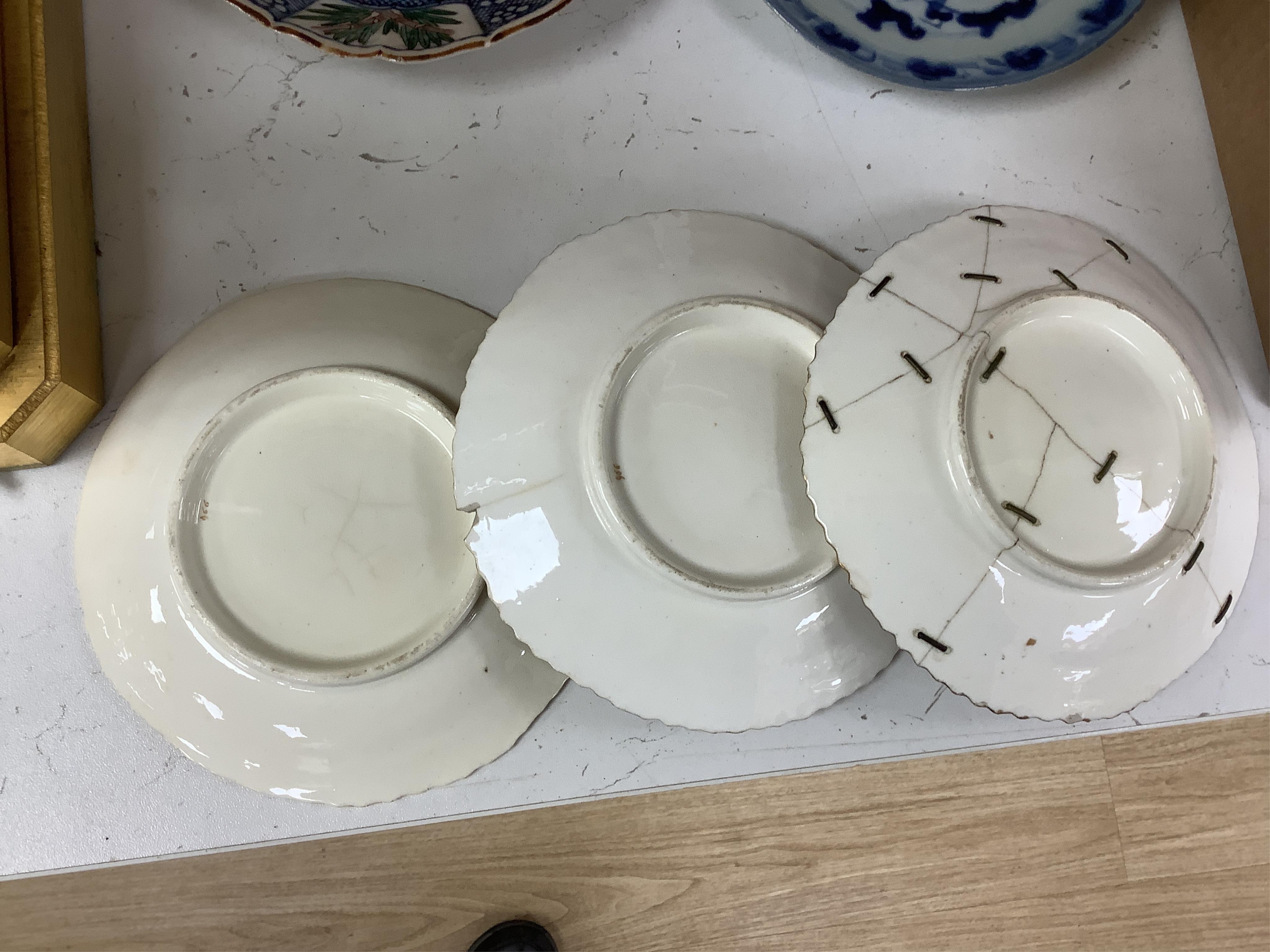 A Coalport floral part teaset, c.1825, to include teapot, sandwich plates and cups & saucers. Condition - poor to fair